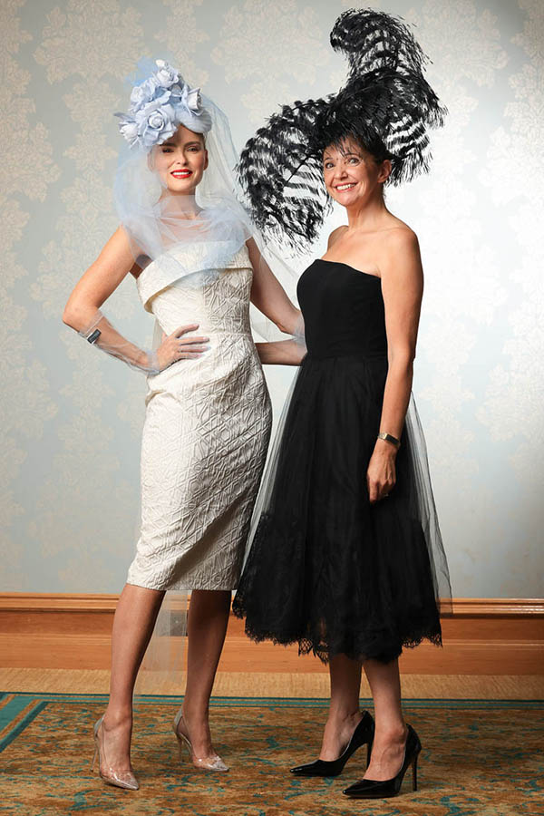 A great fitting strapless dress always creates an iconic and classic look. This statement black gown is composed of a structured boned bodice and a Ballerina style skirt with multiple layers of soft tulle and a French lace edging creating a softness that feels light, luxurious, and romantic.