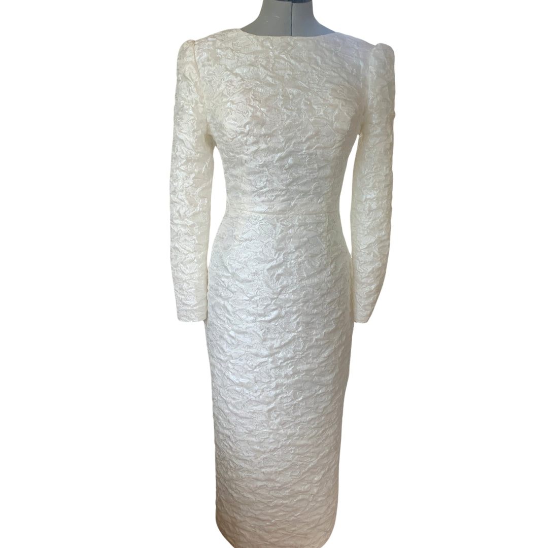 Warm Ivory tailored jacquard dress with a blush feather and bead detachable peplum.