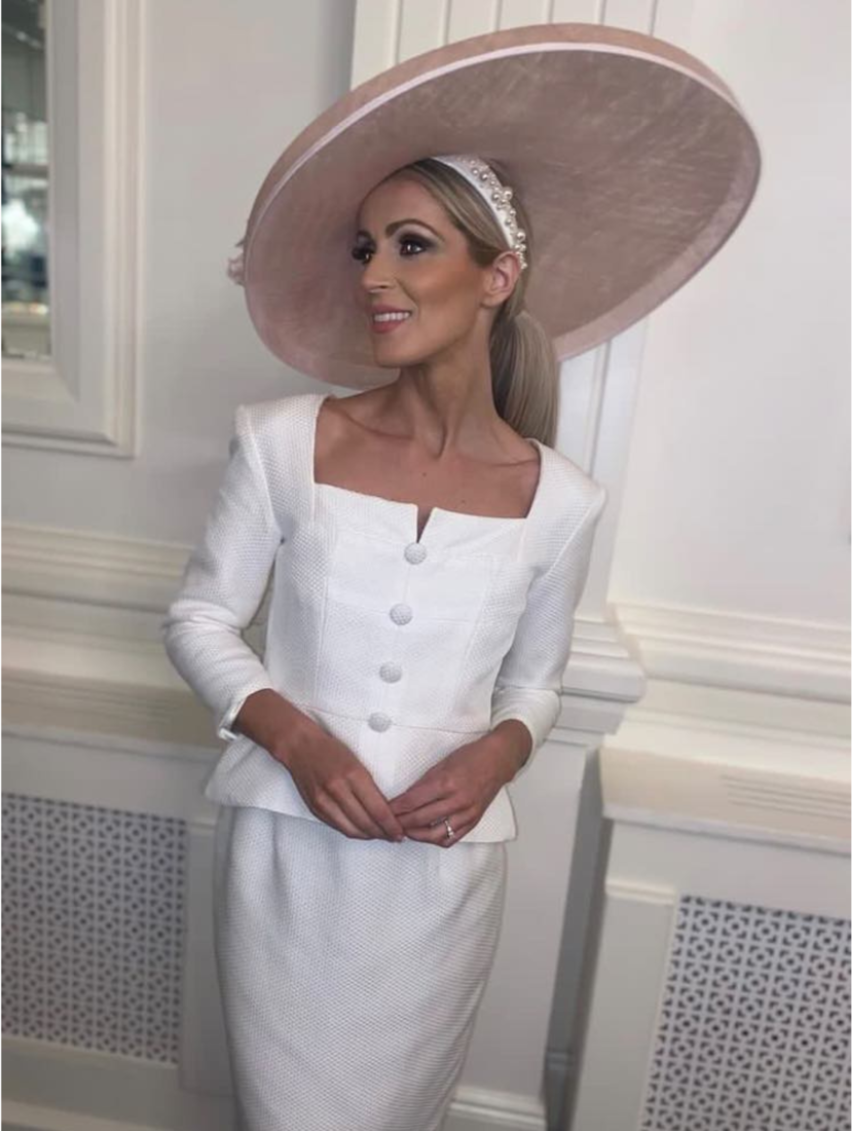 This two piece radiates understated elegance with clean lines and subtle details that create a timeless, classic design inspired by Vintage fashion. Perfect for a wedding or Special Occasion. 